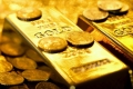 أونصة الذهب تتراجع بضغط من قوة الدولار
