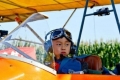 بالصور: طفل صيني ينجح في قيادة طائرة لمدة 35 دقيقة