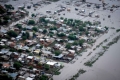 بعد مداهمة سياراتهم ومنازلهم فجأة... بالصور: فيضانات تقتل العشرات في الأرجنتين