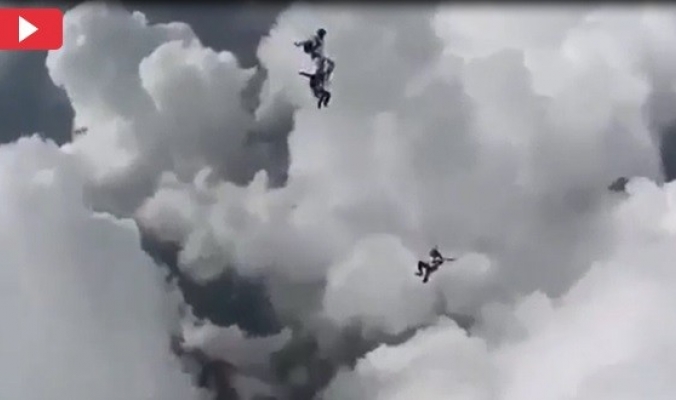 فيديو فريد من نوعه ...مظليون يقفزون داخل سحب ممطرة !