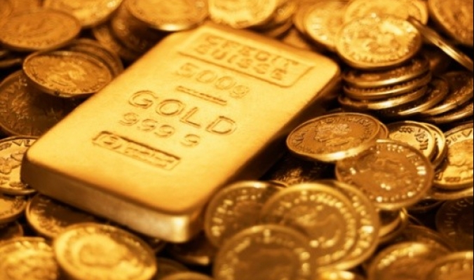 الذهب يتجه إلى تكبد ثالث خسارة سنوية والآفاق قاتمة في 2016