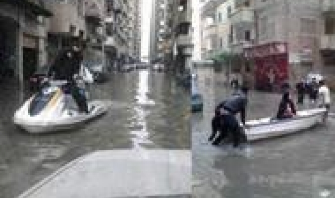 بالفيديو: مصري يسخر من الأمطار بالتزحلق على &quot;زلاجة ثلج&quot;