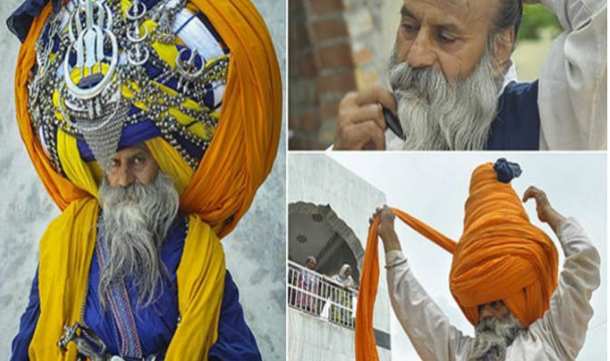 فيديو.. هندي يرتدي أكبر عمامة في العالم