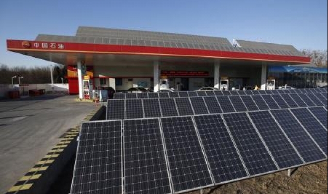 الصين ترفع توليد الطاقة الشمسية 60% في 2014